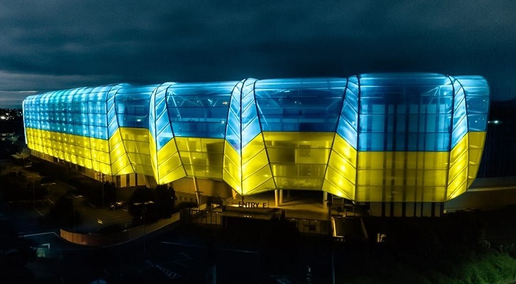Venues around the world light up in solidarity with Ukraine