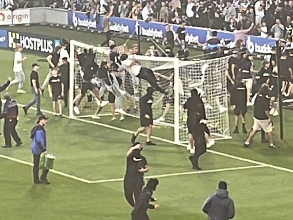 A-League Melbourne derby abandoned as fan protest leads to on field violence