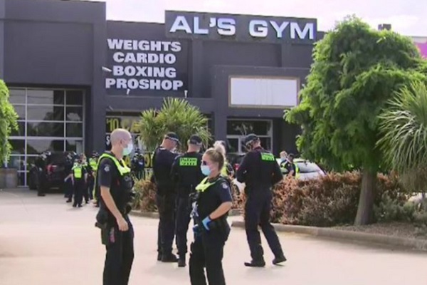 Victoria Police make three arrests after storming Melbourne gym ignoring lockdown