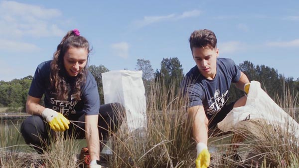 Tokyo Olympic hopefuls join volunteers at Sydney Olympic Park for Clean Up Australia Day