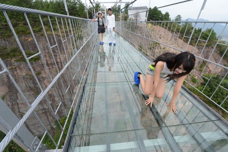 New glass suspension bridge crosses Chinese canyon