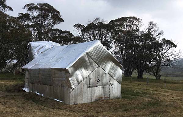 Parks Victoria collaborates to protect historic huts from bushfires