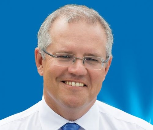 Australian Prime Minister Scott Morrison halts international travel and bans indoor gatherings of over 100