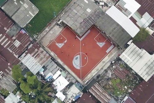 Oddly shaped football pitches encourage community sport in Bangkok