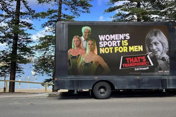 Australian Olympic Committee and Swimming Australia threaten lobby group with legal action over trans women’s sport billboards
