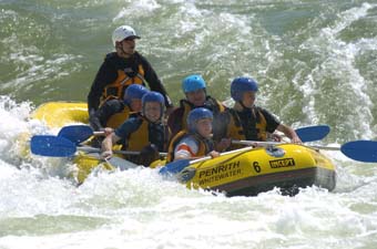 Corporate teams bond to meet the challenges of man-made rapids