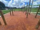 Newly installed fitness equipment area at Onehunga Bay Reserve features recycled surface