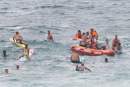 Ironmen and Ironwomen save swimmers from rip at Sydney beach