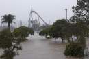 South east Queensland deluge closes Dreamworld, Movie World and Wet’n'Wild Gold Coast